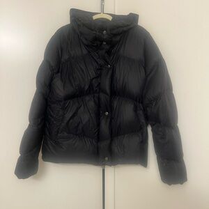 Cotopaxi cute jacket. Really warm coat but very lightweight. Stylish cut